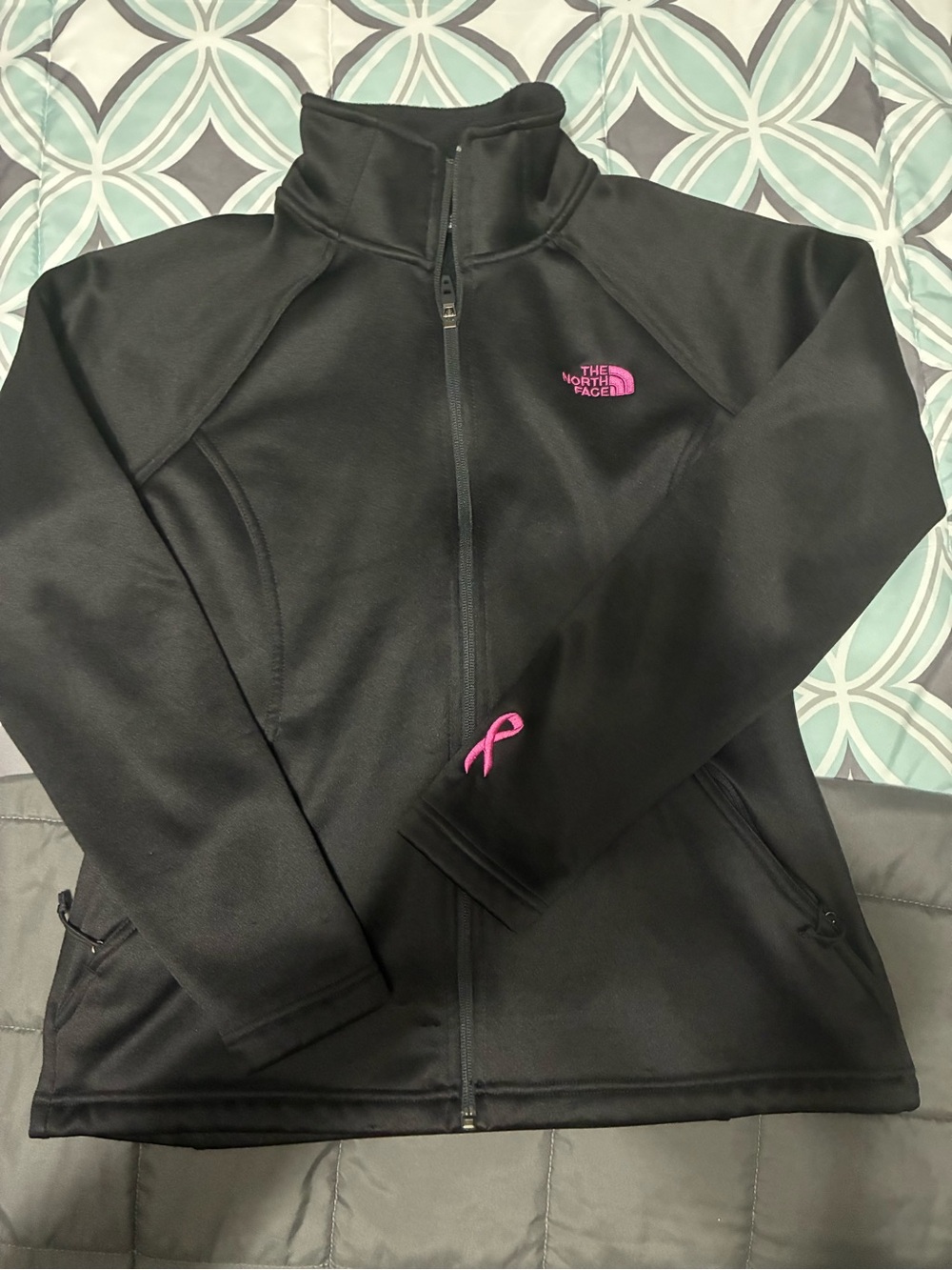 The North Face Black Fleece Jacket with Pink Logo and Ribbon